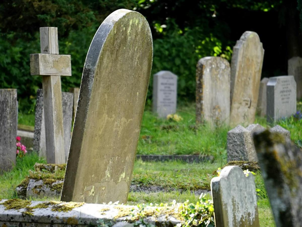 close up photography of concrete tombstones