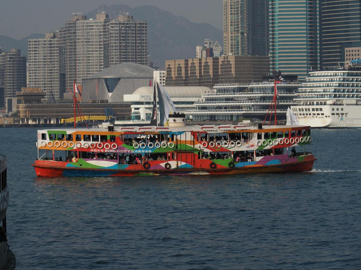 colorful ferry on hong kong victoria harbour