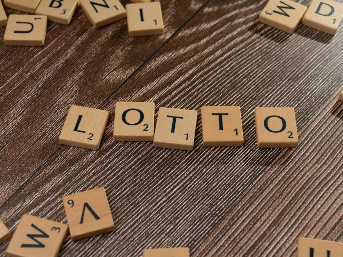 lottery scrabble letters on a wooden table