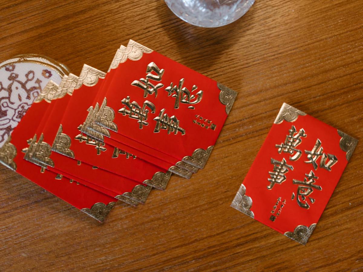close up photo of red envelopes