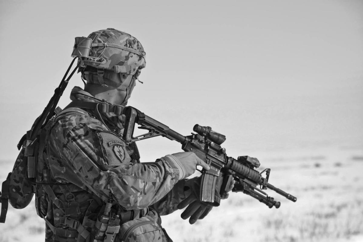 soldier aiming rifle