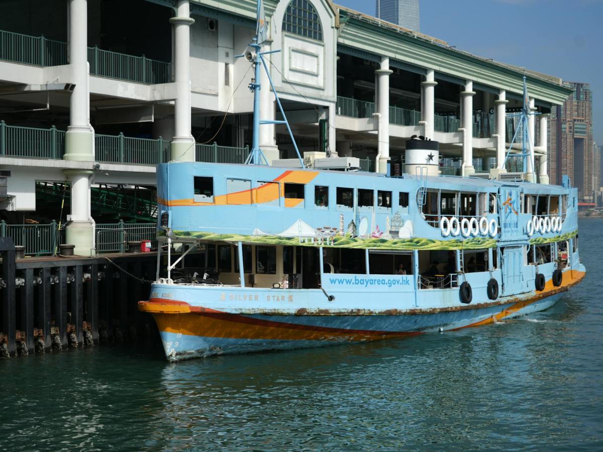 scenic view of colorful ferry at hong kong pier