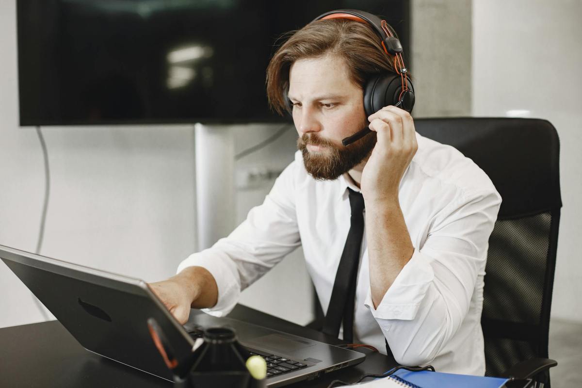 man using headset in office