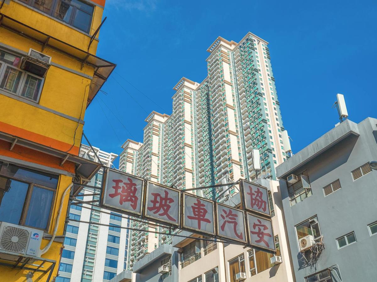 high rise buildings under blue sky