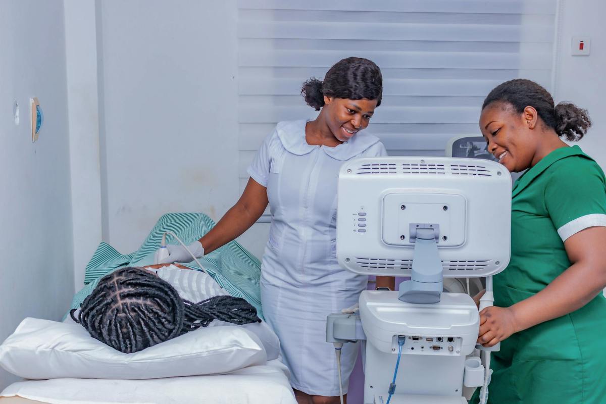 healthcare professionals conducting an ultrasound