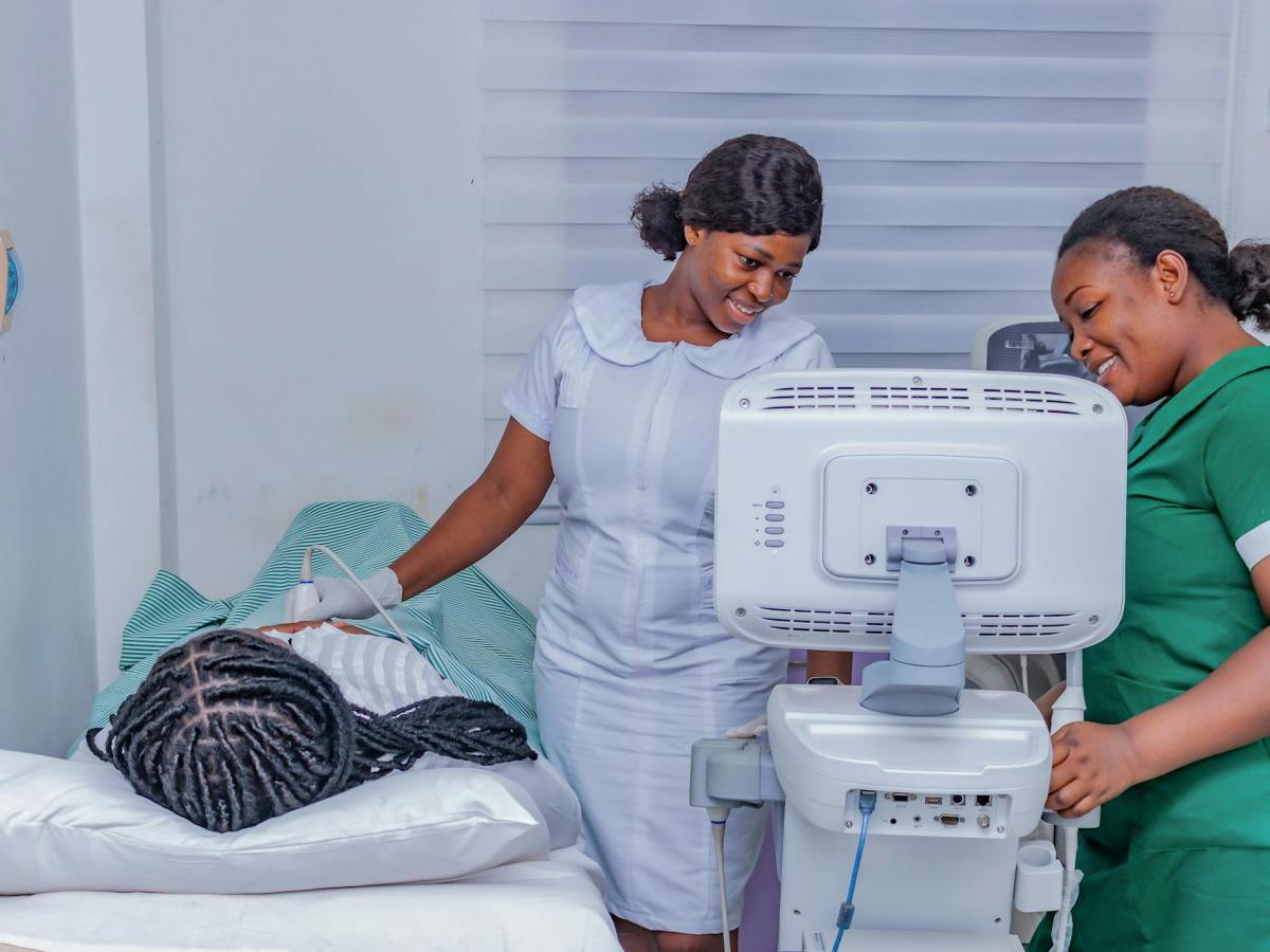 healthcare professionals conducting an ultrasound