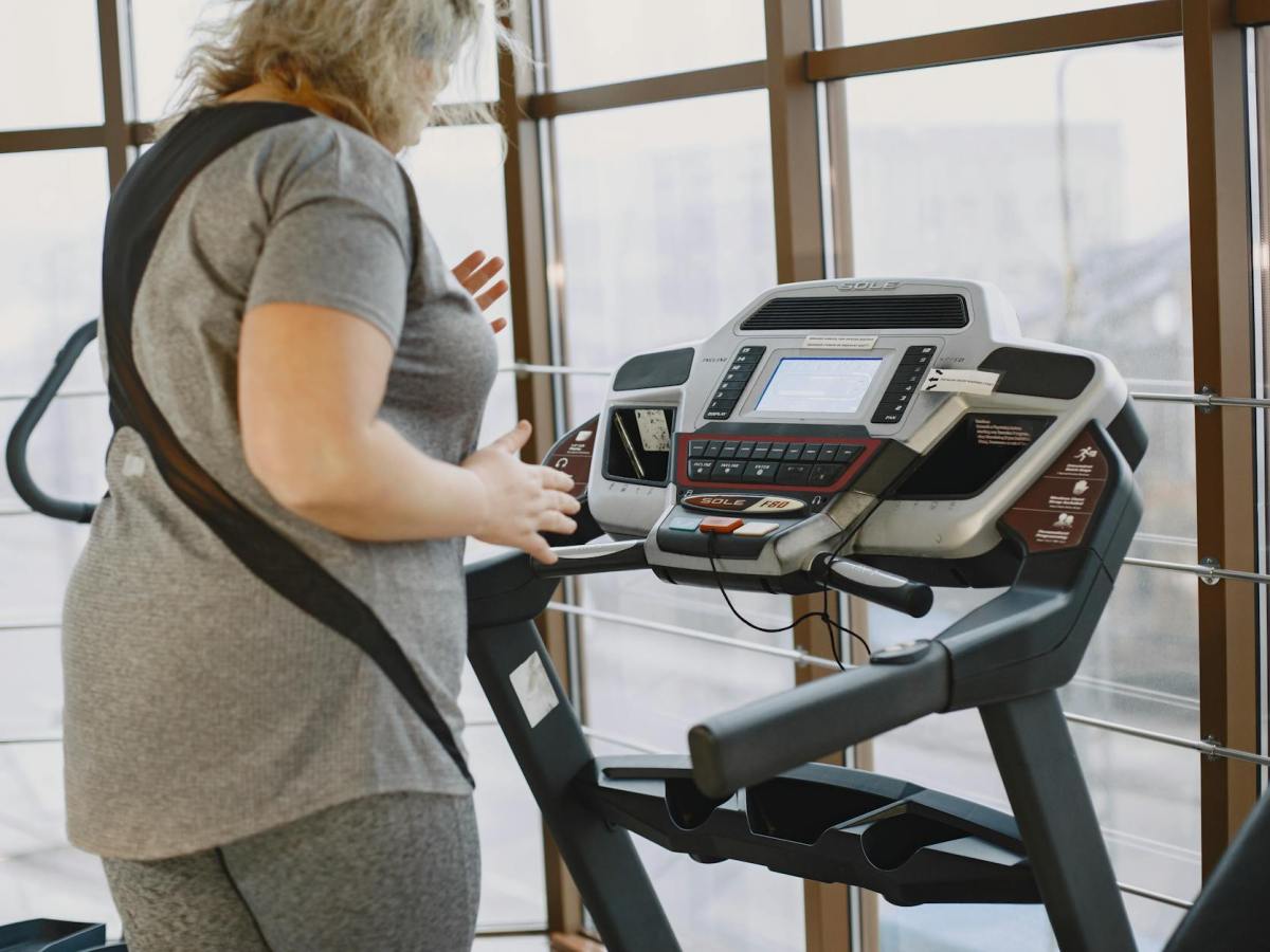 a woman using treadmill
