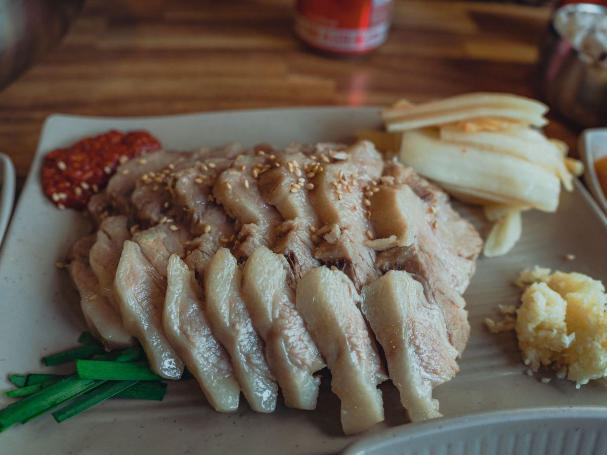 traditional korean bossam with kimchi and garlic