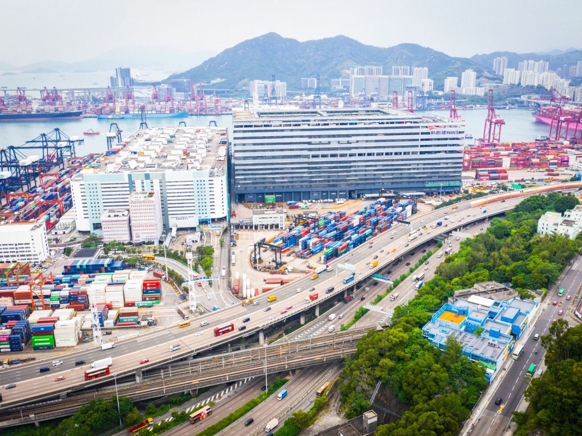 aerial shot of city streets and harbor