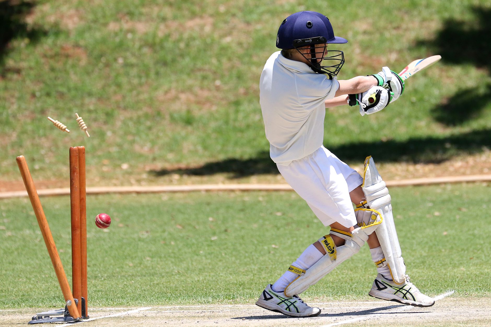 boy in full cricket gear